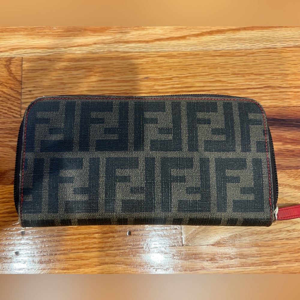 Fendi authentic wallet. Red inside.